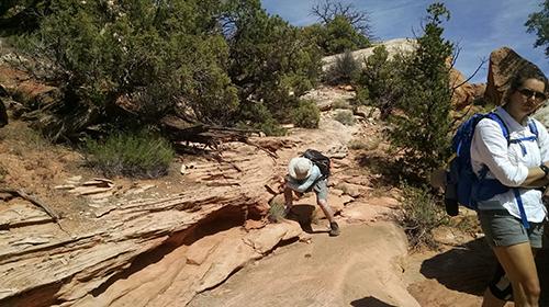 Students outside from geology class on a trip.