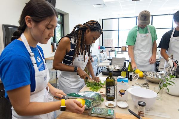 Students at the Whiddon College of Medicine take a class in Culinary Medicine.