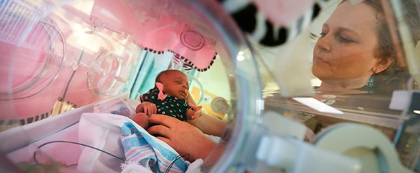 USA Nurse working with baby