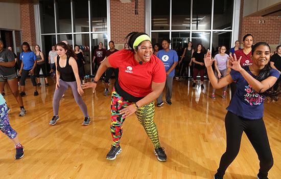 Instructor Crystal teaching a zumba class