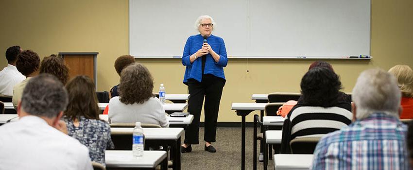 Professor teaching in front of class