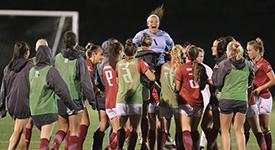 Girls soccer team celebrating