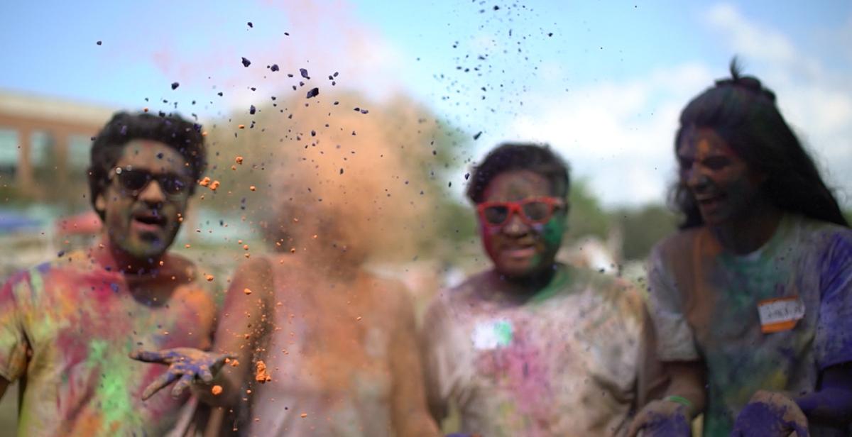 Students celebrating Holi, the Hindu festival of colors.