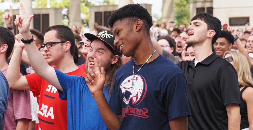 Jordan Morrison, center, showed up early for the Class of 2027 photo at the Moulton Bell Tower. A student-athlete, Morrison is from Huntsville, Alabama, and plans to major in computer science. 
