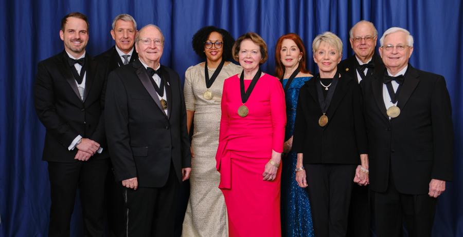 The University of South Alabama National Alumni Association honored alumni and supporters at the 19th annual Distinguished Alumni & Service Awards. Those recognized were, from left, Travis Bedsole Jr., Dr. Jack DiPalma, Susan Bedsole, Alexis Atkins, Maxey Roberts representing the USA Foundation, Chandra Brown Stewart, John McMillan representing the USA Foundation, Dan Ollis and Peter Lindquist. 