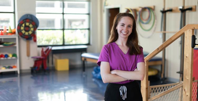 Caroline Locke, who earned bachelor's and master's degrees at the University of South Alabama, works with children in rehabilitation services at the Studer Family Children’s Hospital at Ascension Sacred Heart in Pensacola. 